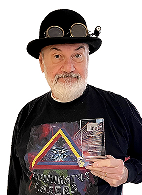 Mike holding Ilda Award 2022